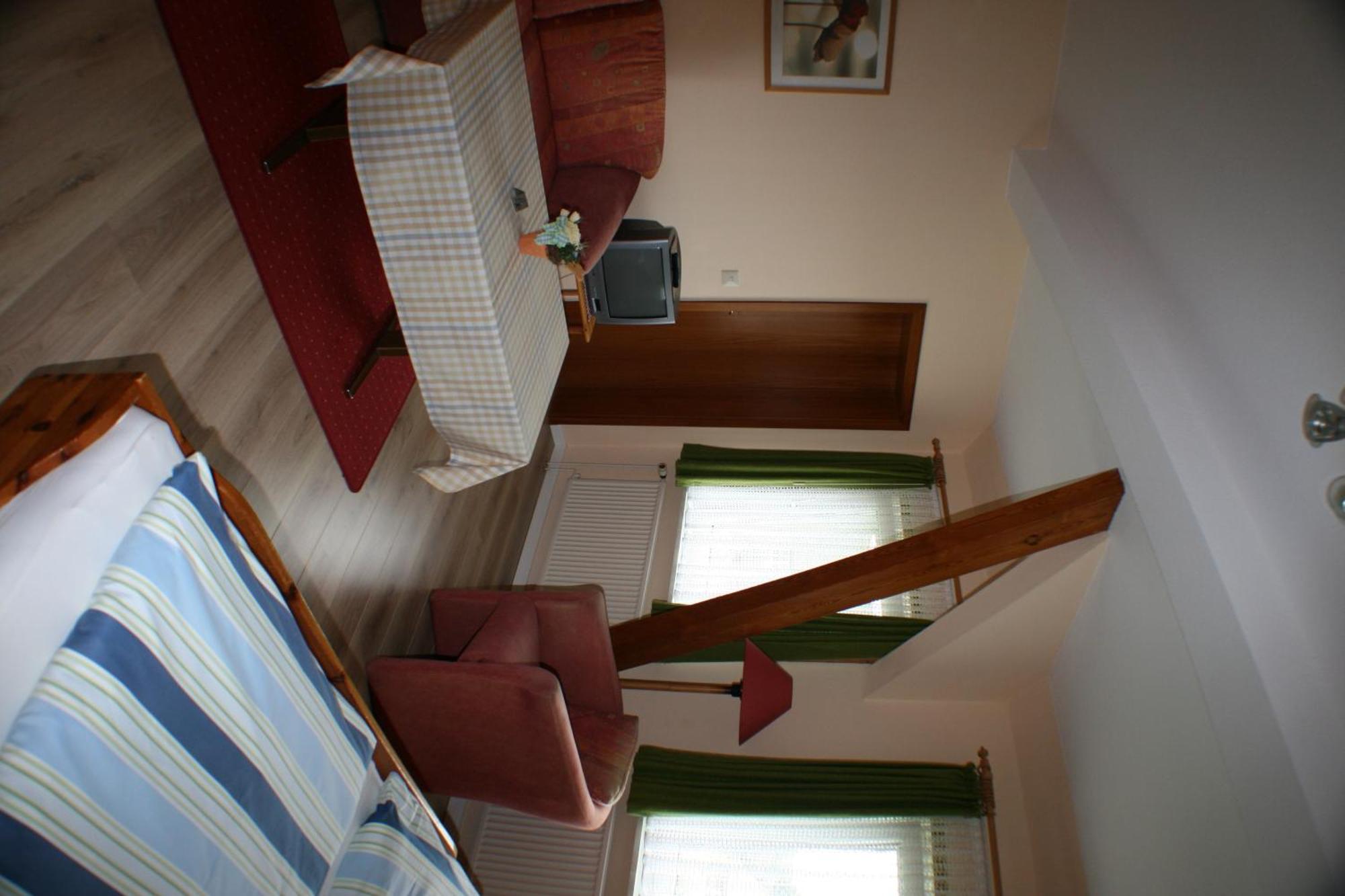 Hotel Garni Zur Post Utersum Habitación foto